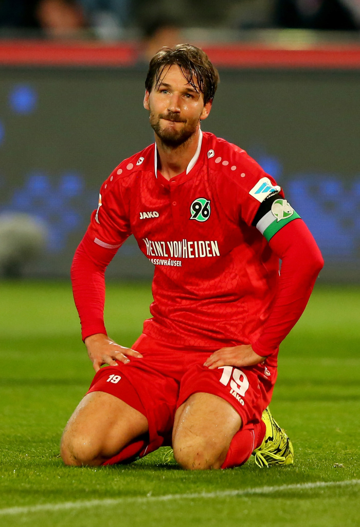 HANOVER, GERMANY - SEPTEMBER 23: Christian Schulz of Hannover reacts during the Bundesliga match between Hannover 96 and VfB Stuttgart at HDI-Arena on September 23, 2015 in Hanover, Germany. (Photo by Martin Rose/Bongarts/Getty Images)