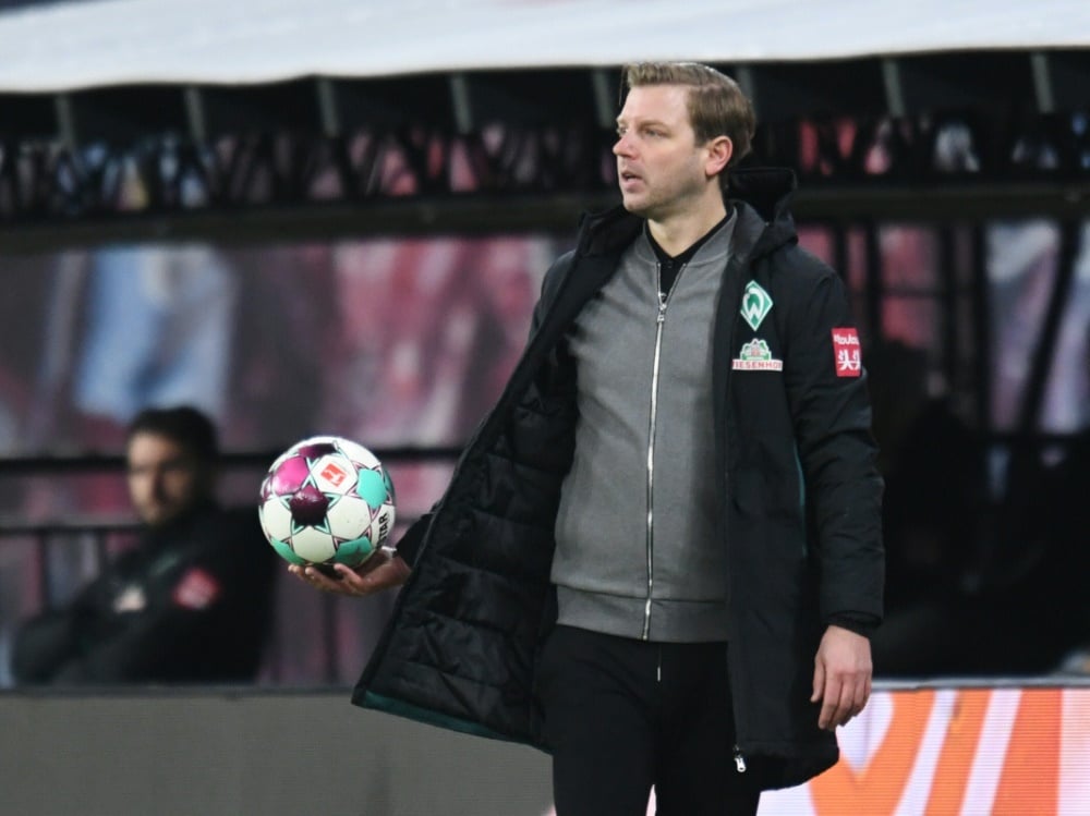 Zufrieden: Werder-Trainer Florian Kohfeldt (Photo by AFP/SID/ANNEGRET HILSE)